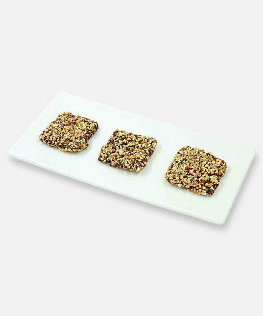 Almond Praline Caramel 500 Gm In Dark Chocolate Sweet
